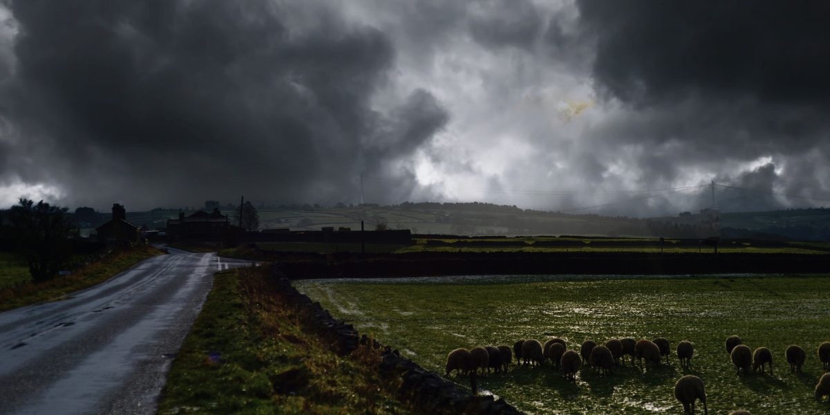 Photo of storm approaching on rural road