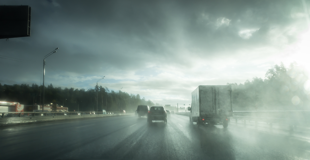 Photo of vehicles on motorway in stormy weather